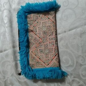 JADEtribe Panada fringe blue clutch